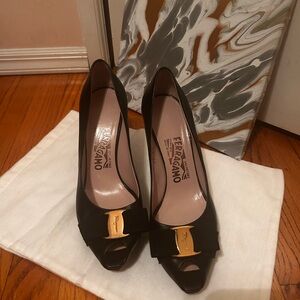 Salvatore Ferragamo Black Peep-Toe Heels with Gold Accent
